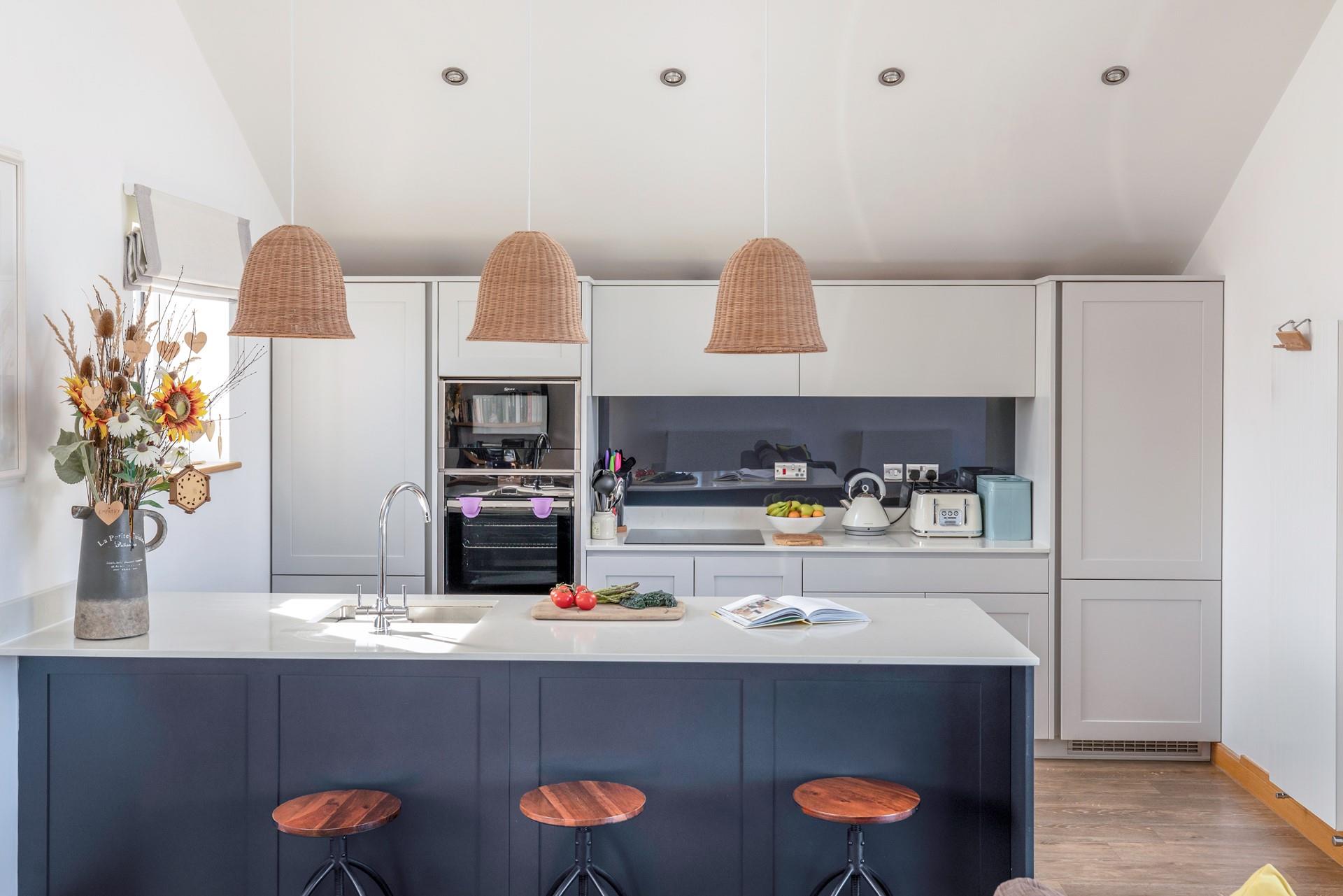 The sleek and stylish kitchen provides all you need for cooking delicious holiday meals.