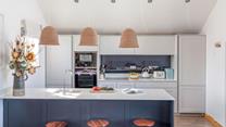 The sleek and stylish kitchen provides all you need for cooking delicious holiday meals.