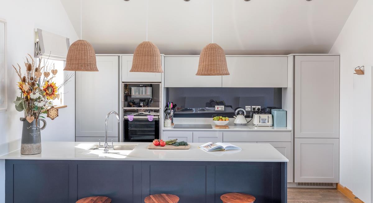 The sleek and stylish kitchen provides all you need for cooking delicious holiday meals.