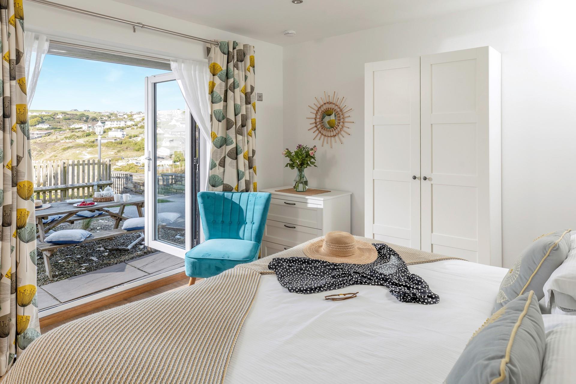 Bedroom 2 has a sea-facing terrace and beautiful views across the valley.