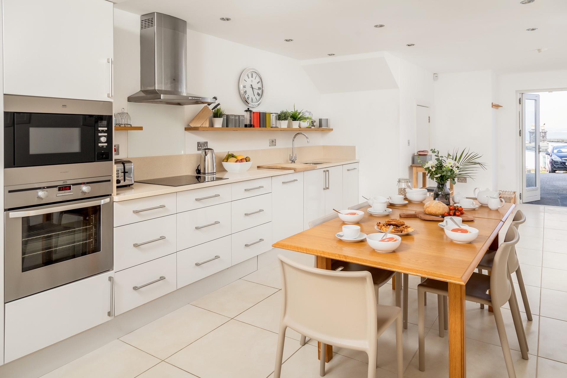 Sit around the table for a family breakfast before packing your beach bag for a day spent in the sun.