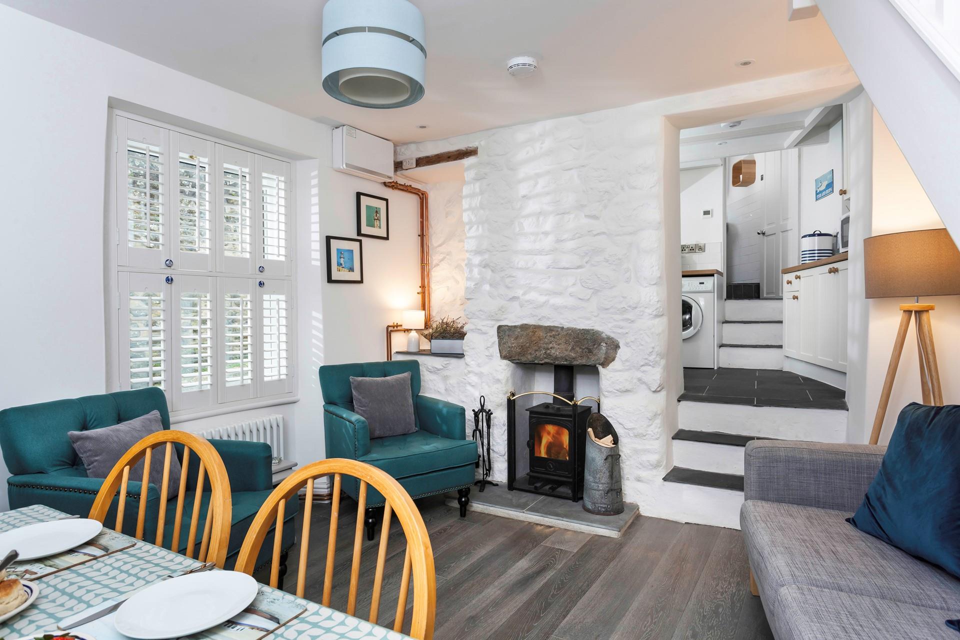 Sit back and relax in front of the roaring wood burner, perfect for warming yourself back up after a fresh beach walk. 