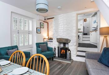 Sit back and relax in front of the roaring wood burner, perfect for warming yourself back up after a fresh beach walk. 