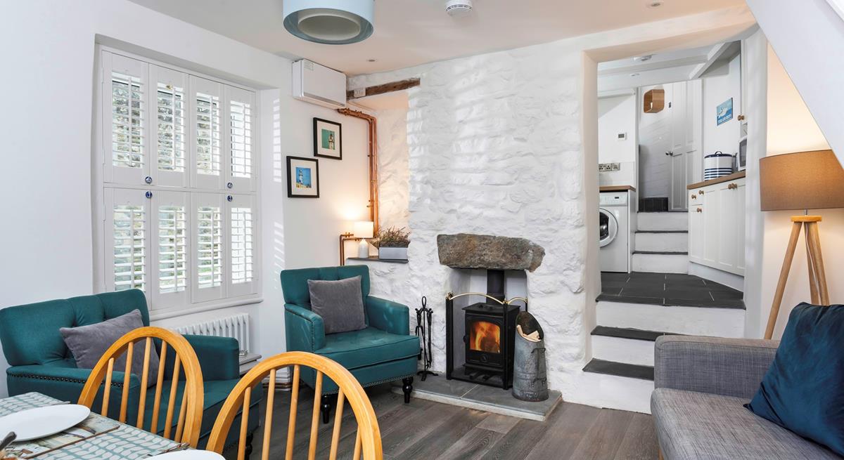 Sit back and relax in front of the roaring wood burner, perfect for warming yourself back up after a fresh beach walk. 