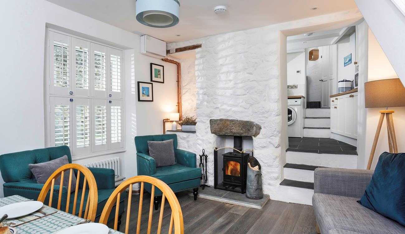 Sit back and relax in front of the roaring wood burner, perfect for warming yourself back up after a fresh beach walk. 