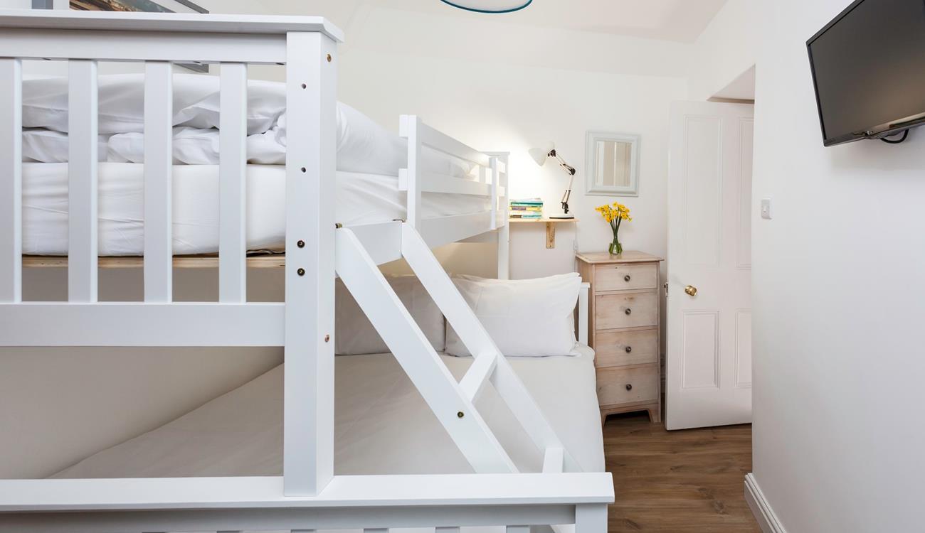 Bedroom 2 has been furnished to accommodate another couple or children. 