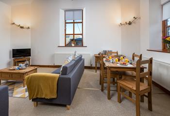 Tastefully designed, the dining and lounge area is perfect for enjoying a late breakfast of homemade pancakes.