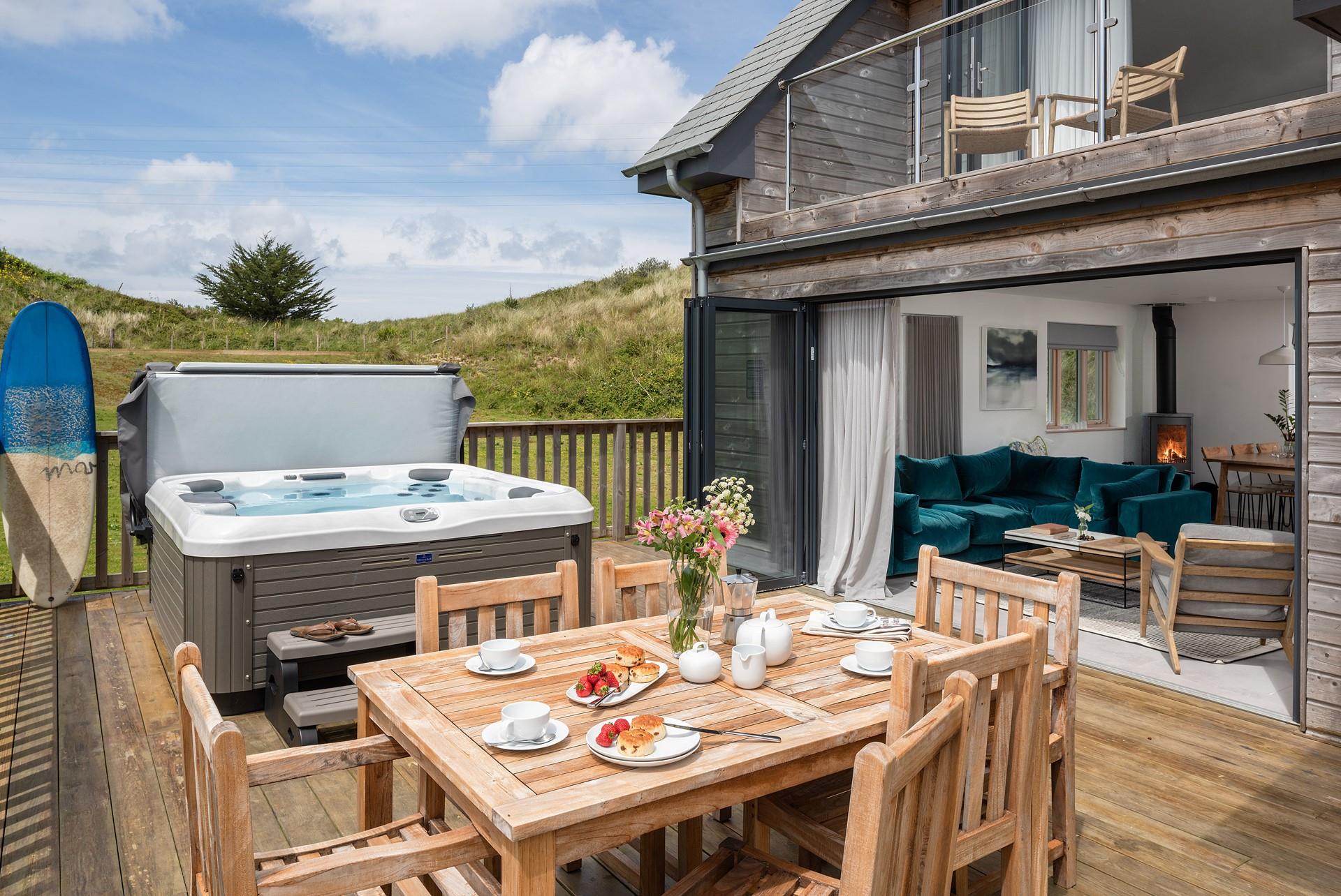 Enjoy al fresco eating on the deck sheltered by the sand dunes.