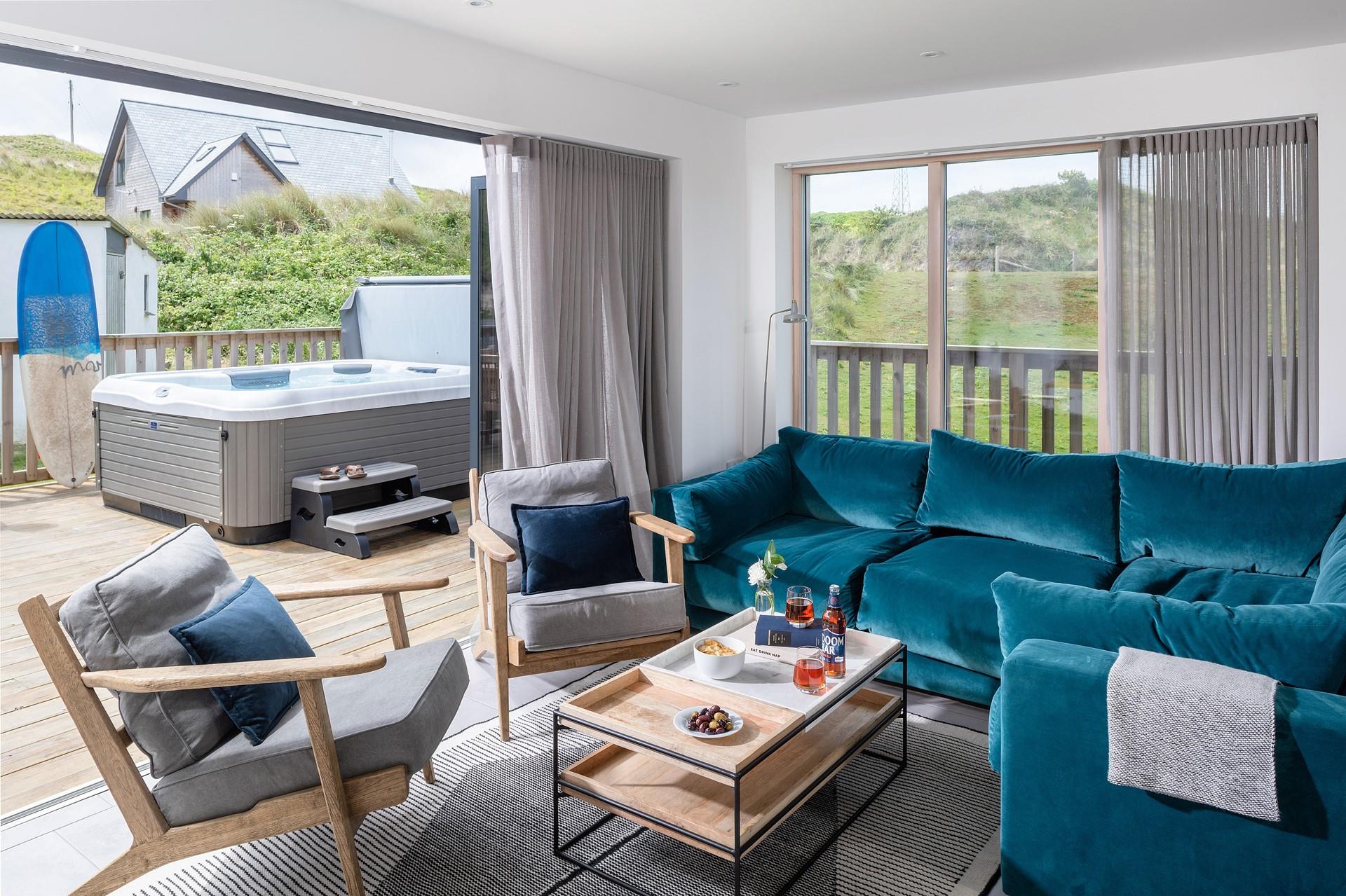 Deep velvet sofas keep the atmosphere cosy in the sitting area.