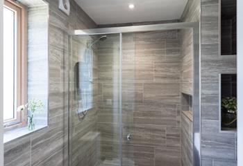 Ground floor walk-in en suite shower room, perfect for rinsing those sandy toes!