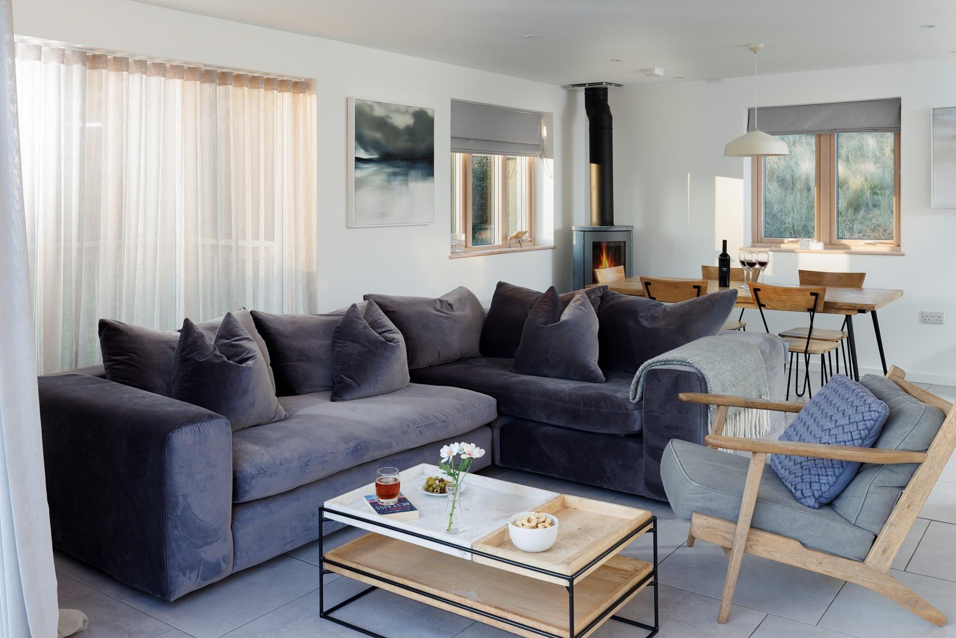 Warm up by the woodburner after bracing winter coastal hikes. 