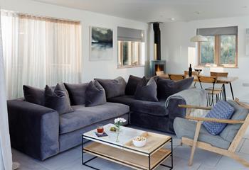 Warm up by the woodburner after bracing winter coastal hikes. 