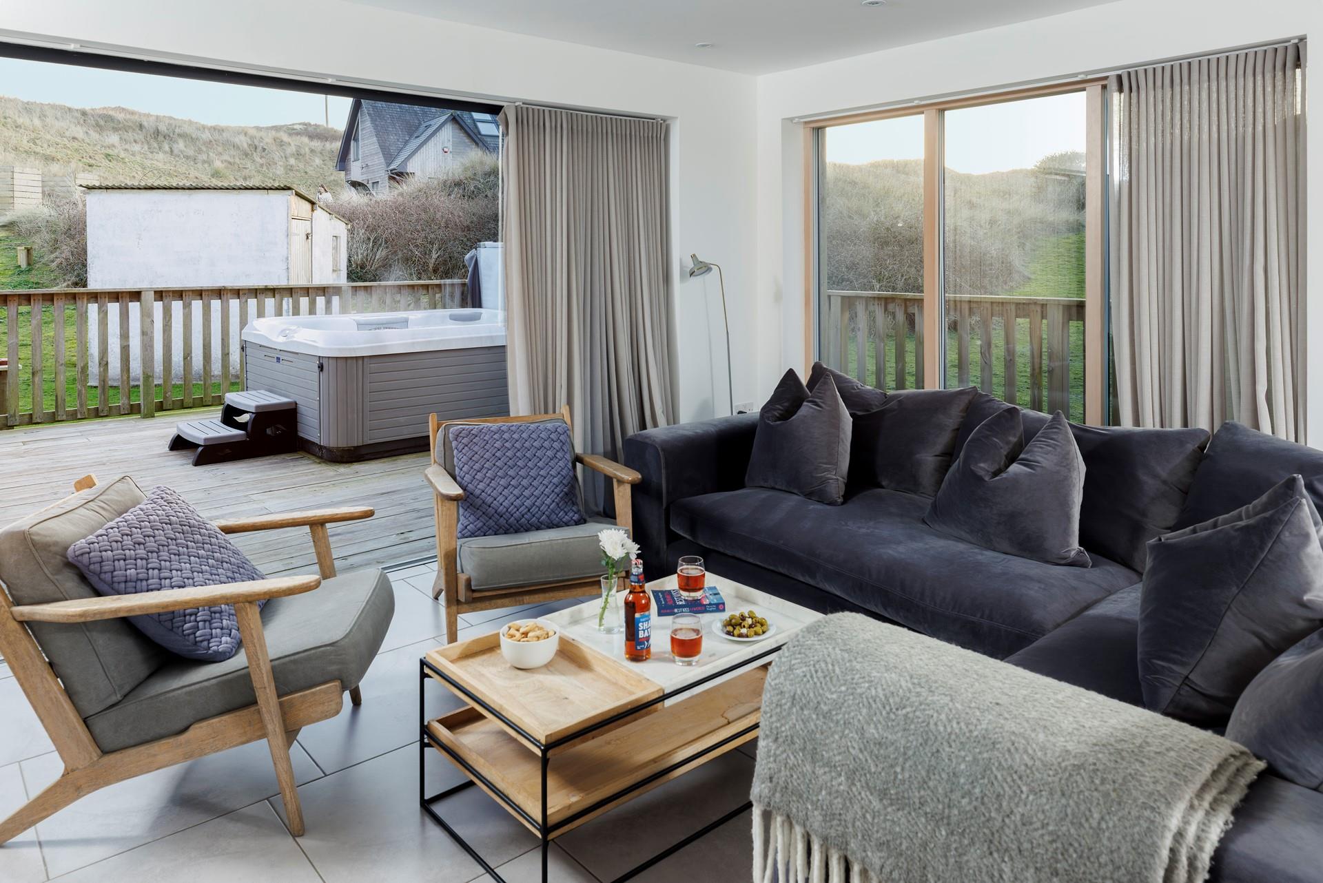 Deep velvet sofas keep the atmosphere cosy in the sitting area.