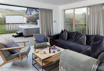 Deep velvet sofas keep the atmosphere cosy in the sitting area.