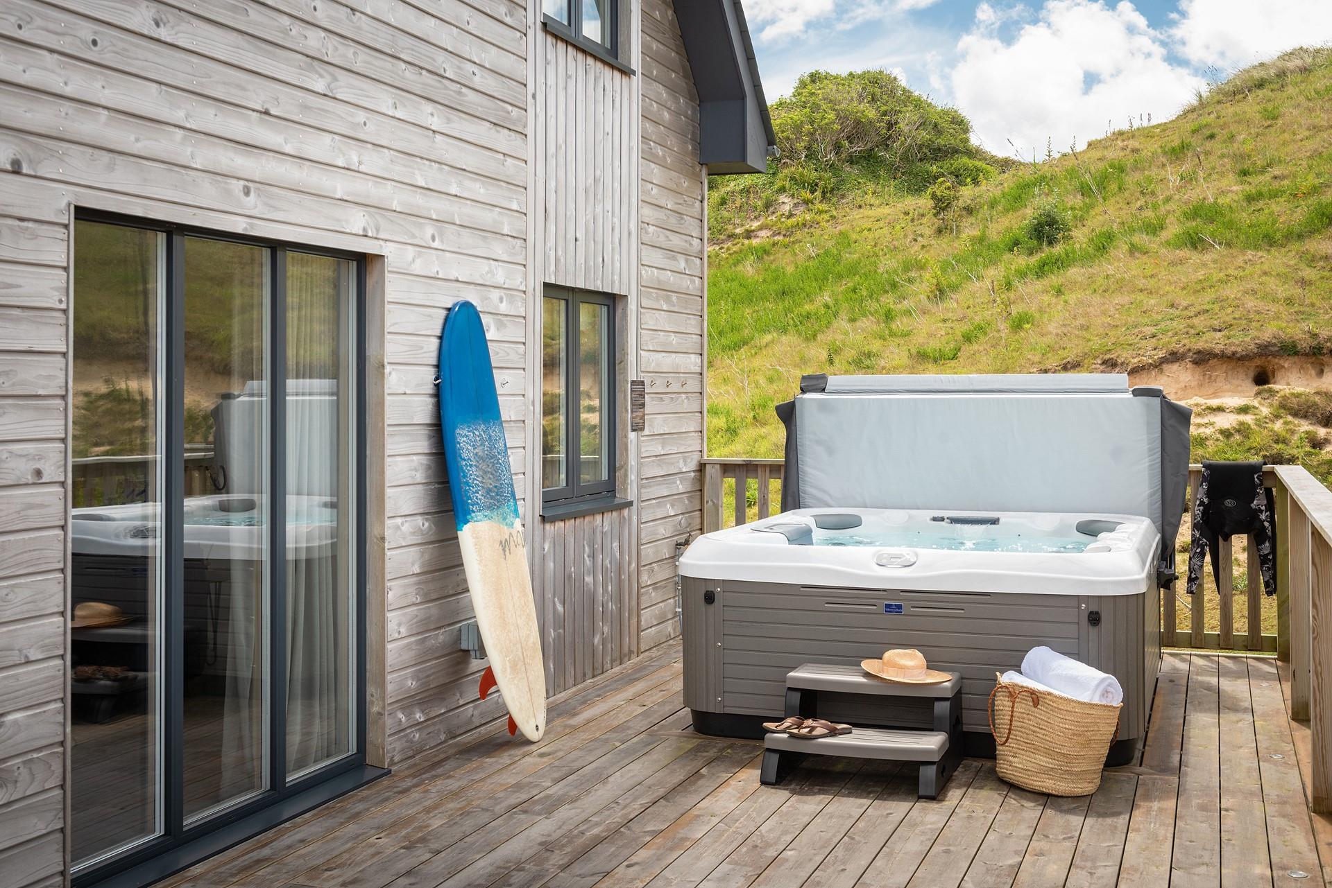 Gaze up to the sky by night in the hot tub, watching for shooting stars.