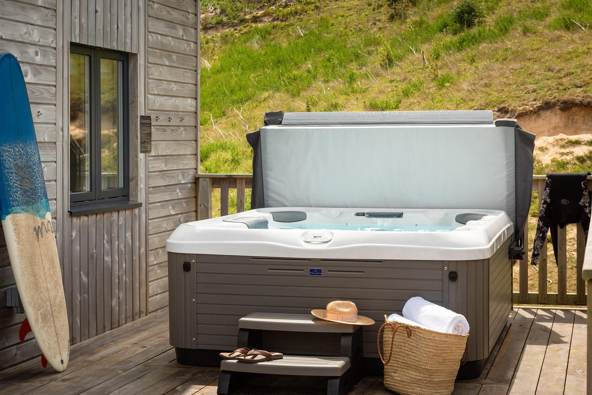 Relax and unwind in your bubbling hot tub.