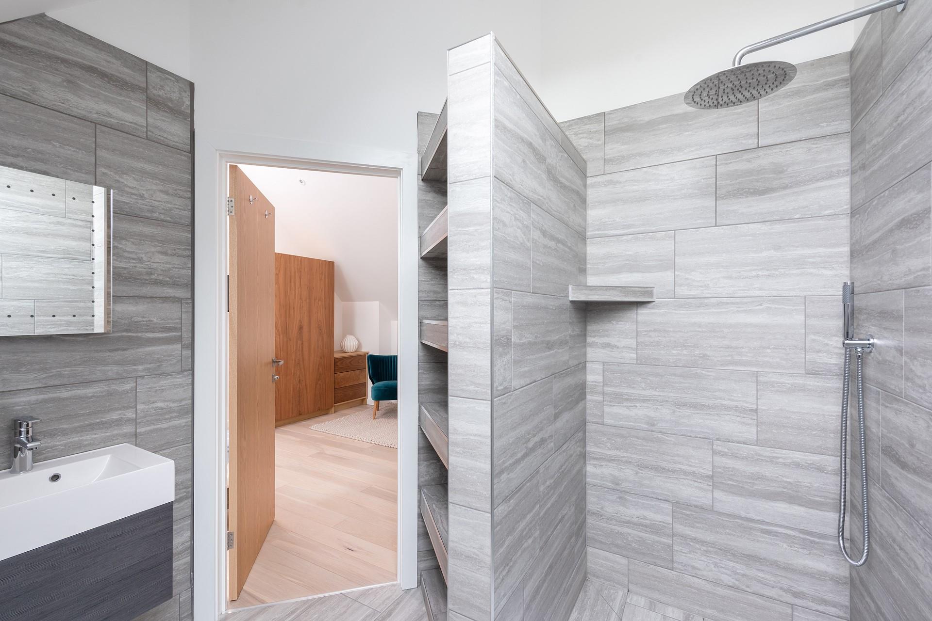The walk-in rainfall shower is a delight after stormy winter walks on the beach.