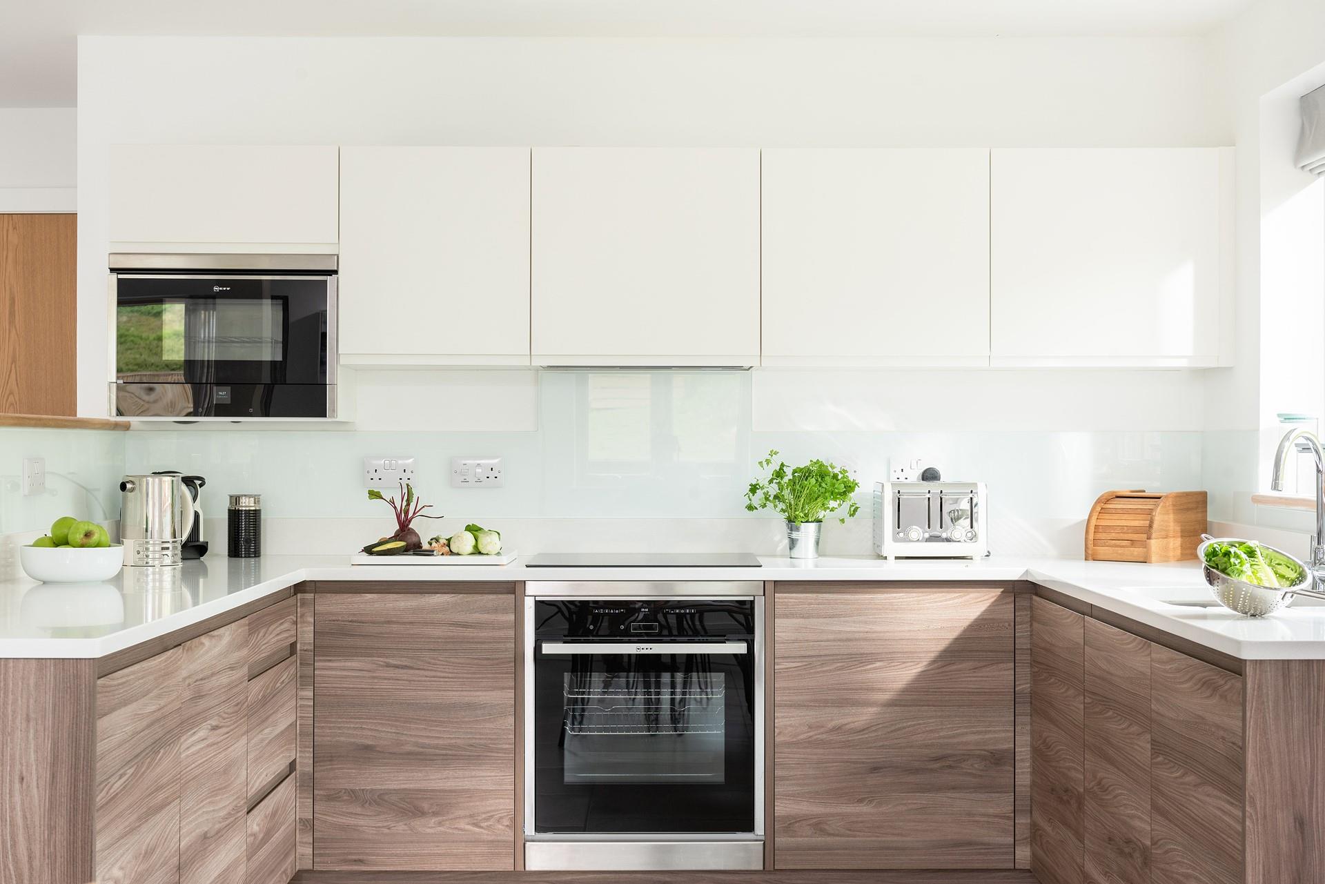 The sleek kitchen has all you need to prepare summer salads or hearty winter meals.