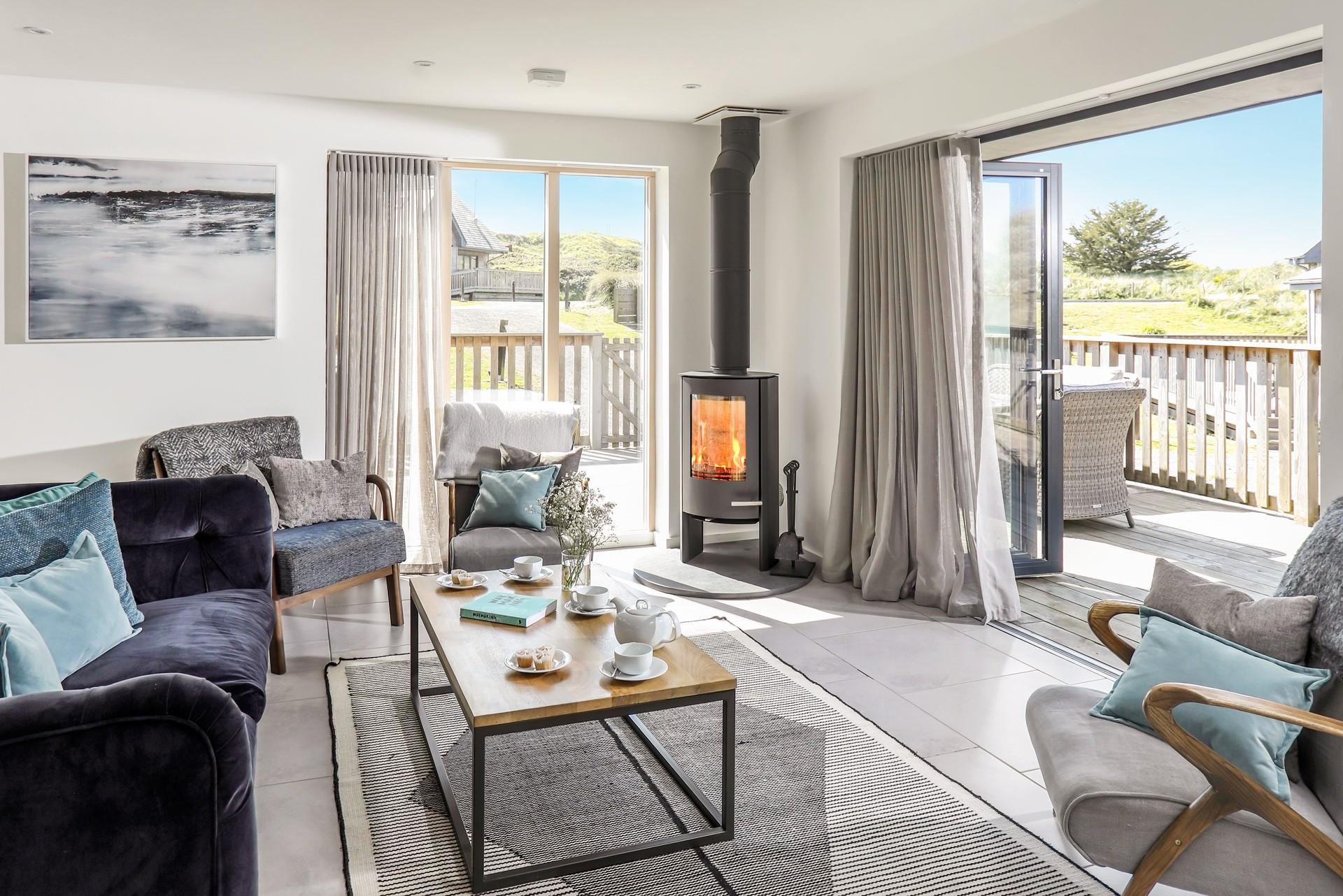 After an afternoon of wave-watching, come back and snuggle up in front of your woodburner.