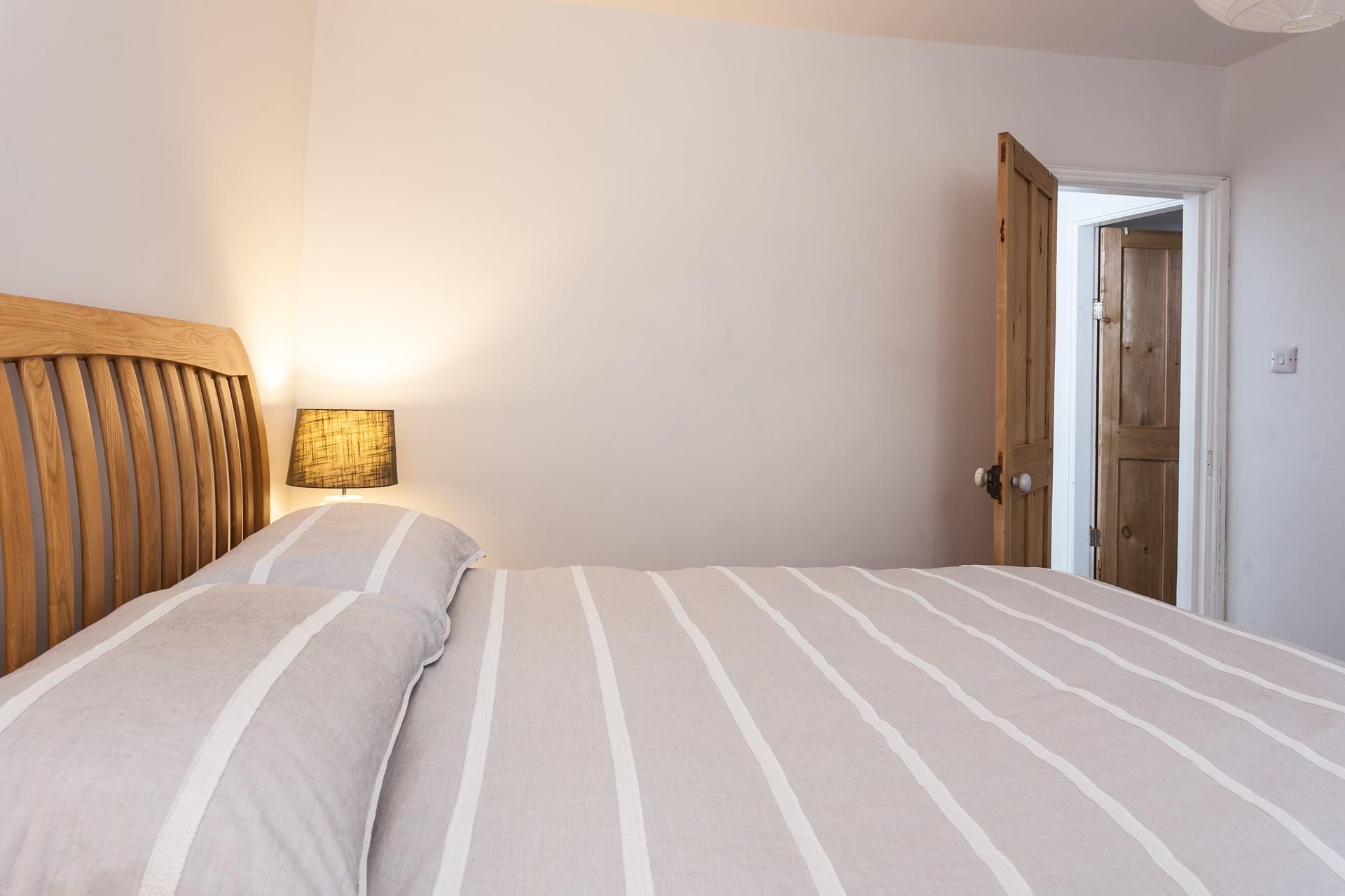 Bedroom 1 has a super spacious king size bed to wake up refreshed each morning.