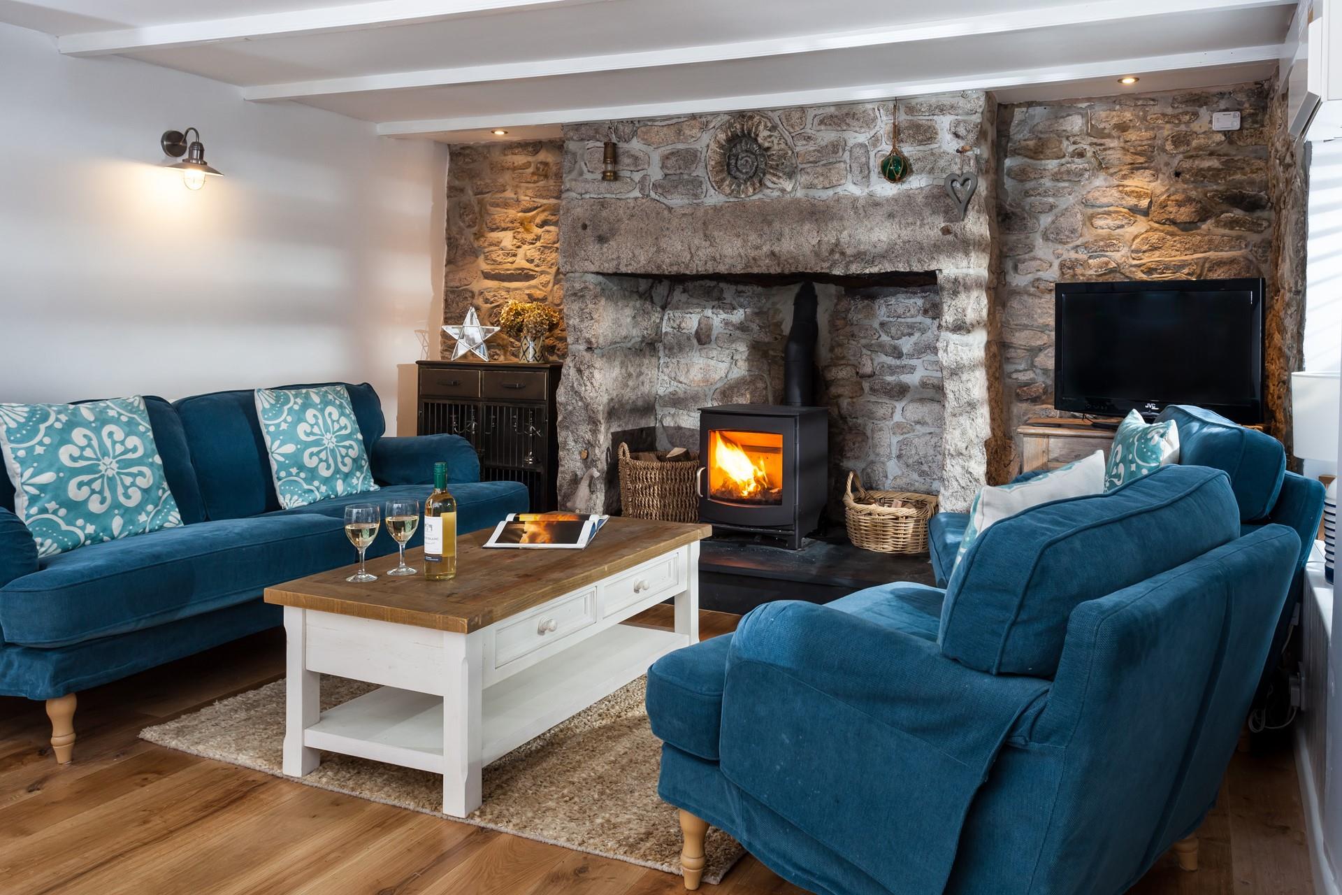 Pour yourself a glass of wine and snuggle up in front of the crackling woodburner, admiring the genuine ammonite in the granite.