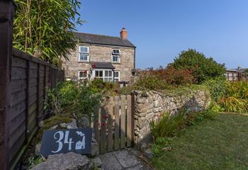This cute country cottage is situated in a secluded but beautiful location.