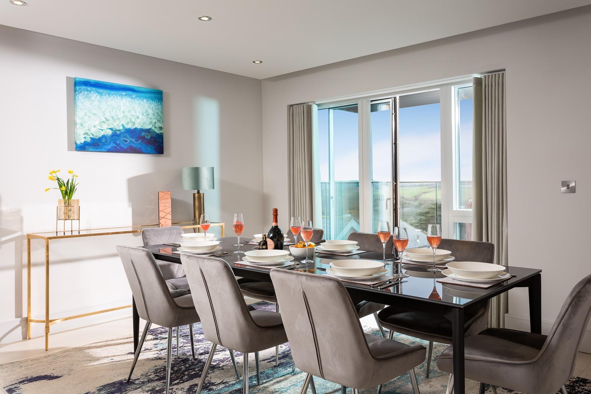 With views of the countryside across the rooftops, the dining area and front balcony get the most out of the lovely sun.