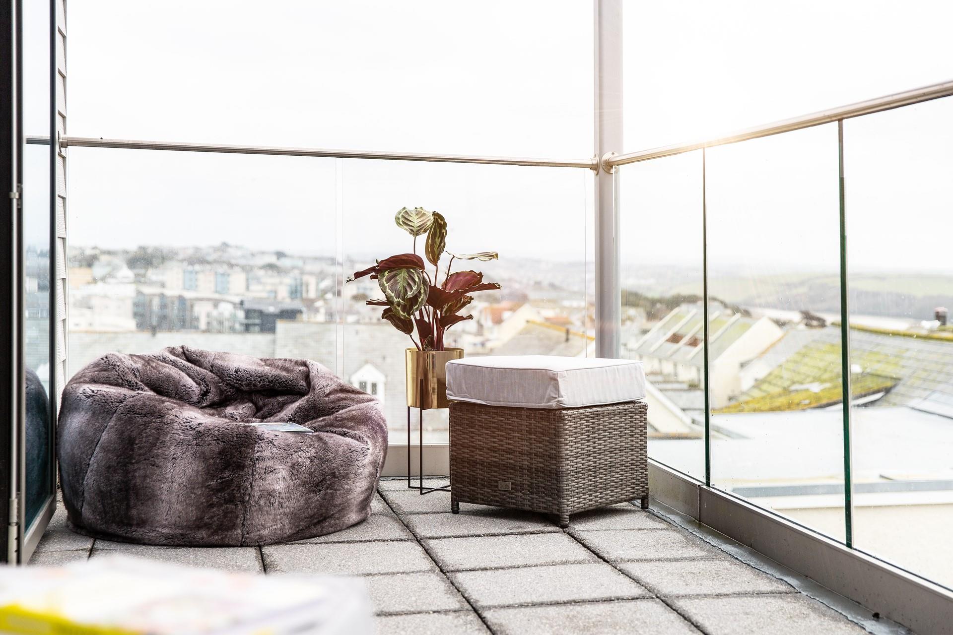 Spend evenings relaxing on the balcony after days spent on the beach.