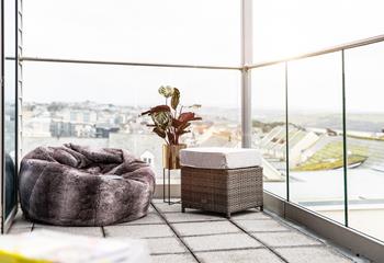 Spend evenings relaxing on the balcony after days spent on the beach.