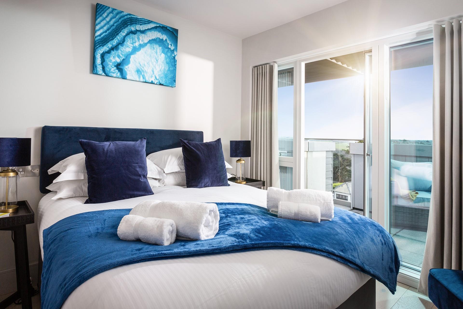 Step out of bed straight out onto the balcony of bedroom 2, with zip and link beds perfect for couples and children alike.