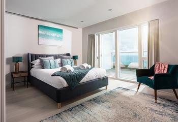 Bedroom 4 enjoys a king size bed and superb views of the sea and Fistral beach.