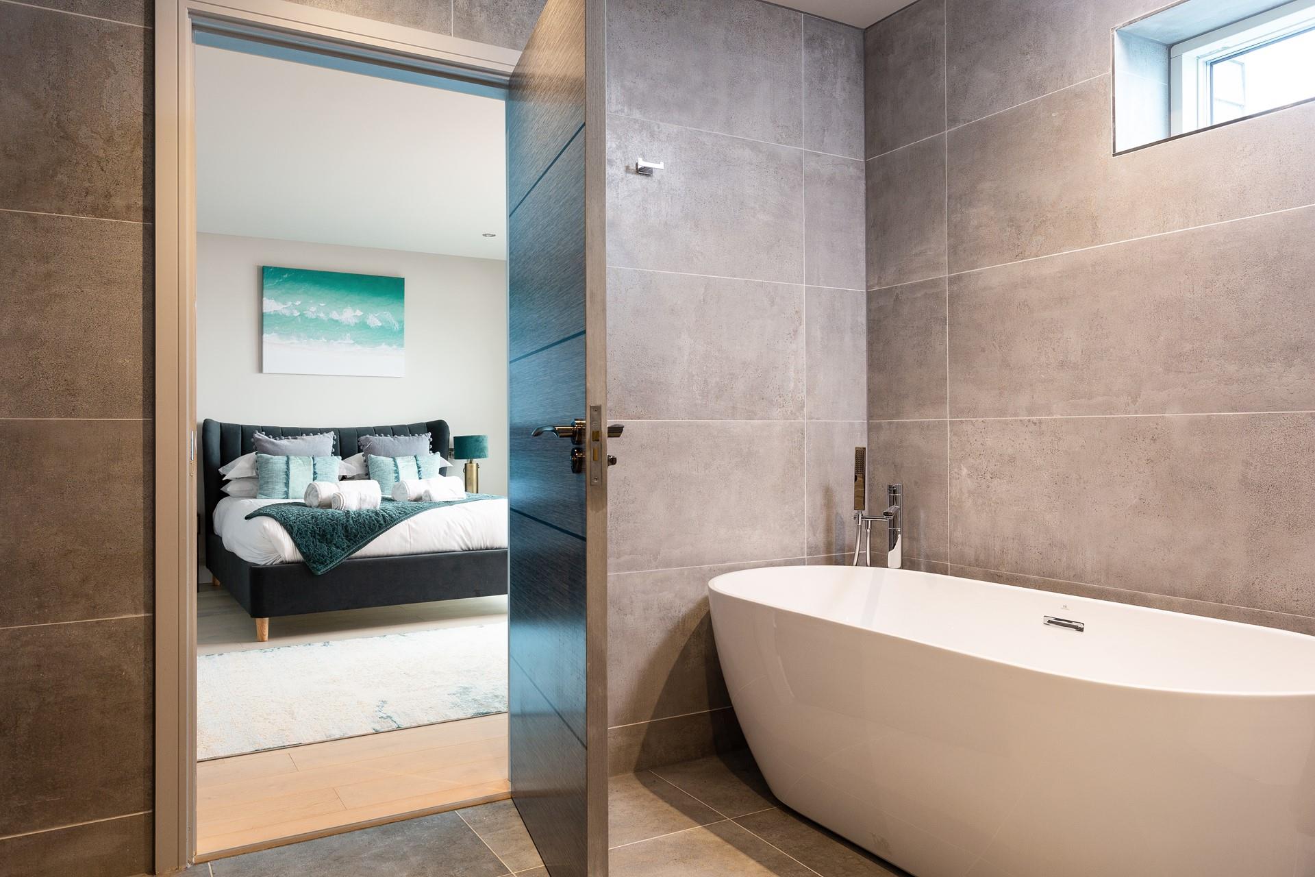 Enjoy a soak before bedtime in the gorgeous bath, before sinking into the cosy feather pillows for a restful nights sleep. 