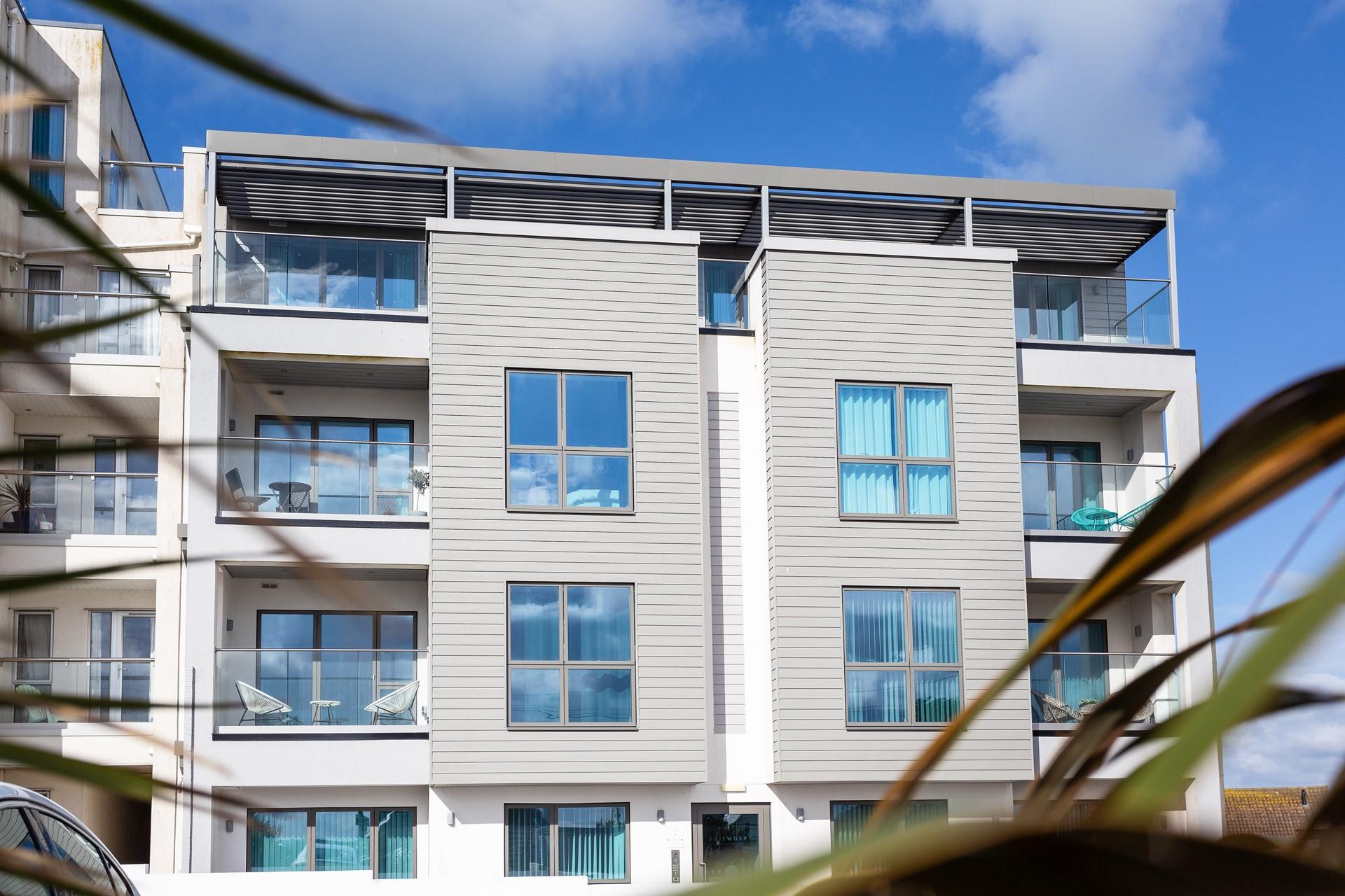 Saltwater Penthouse is on the third floor of this newly built apartment complex, in a highly sought-after area.