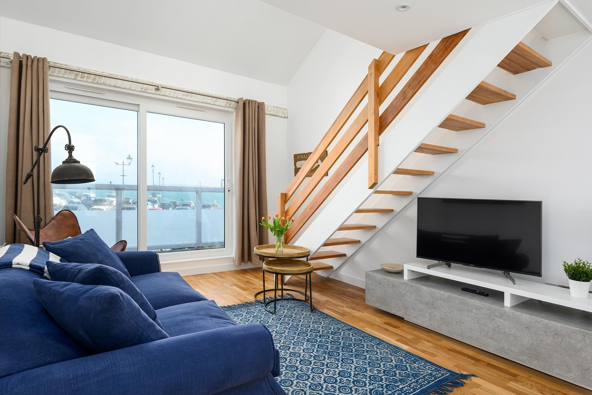 After a fun-filled day curl up on the plush sofa and relax in front of the TV.