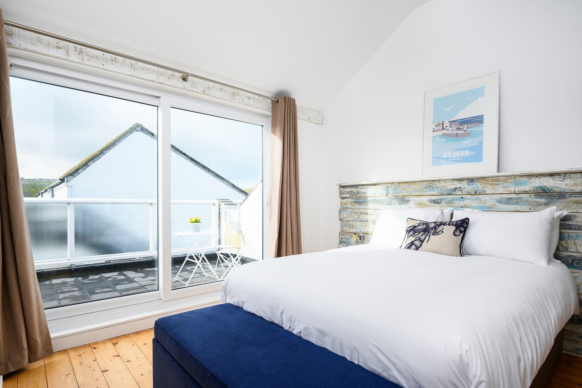 Step out of bed and straight onto the balcony into the fresh Cornish air.