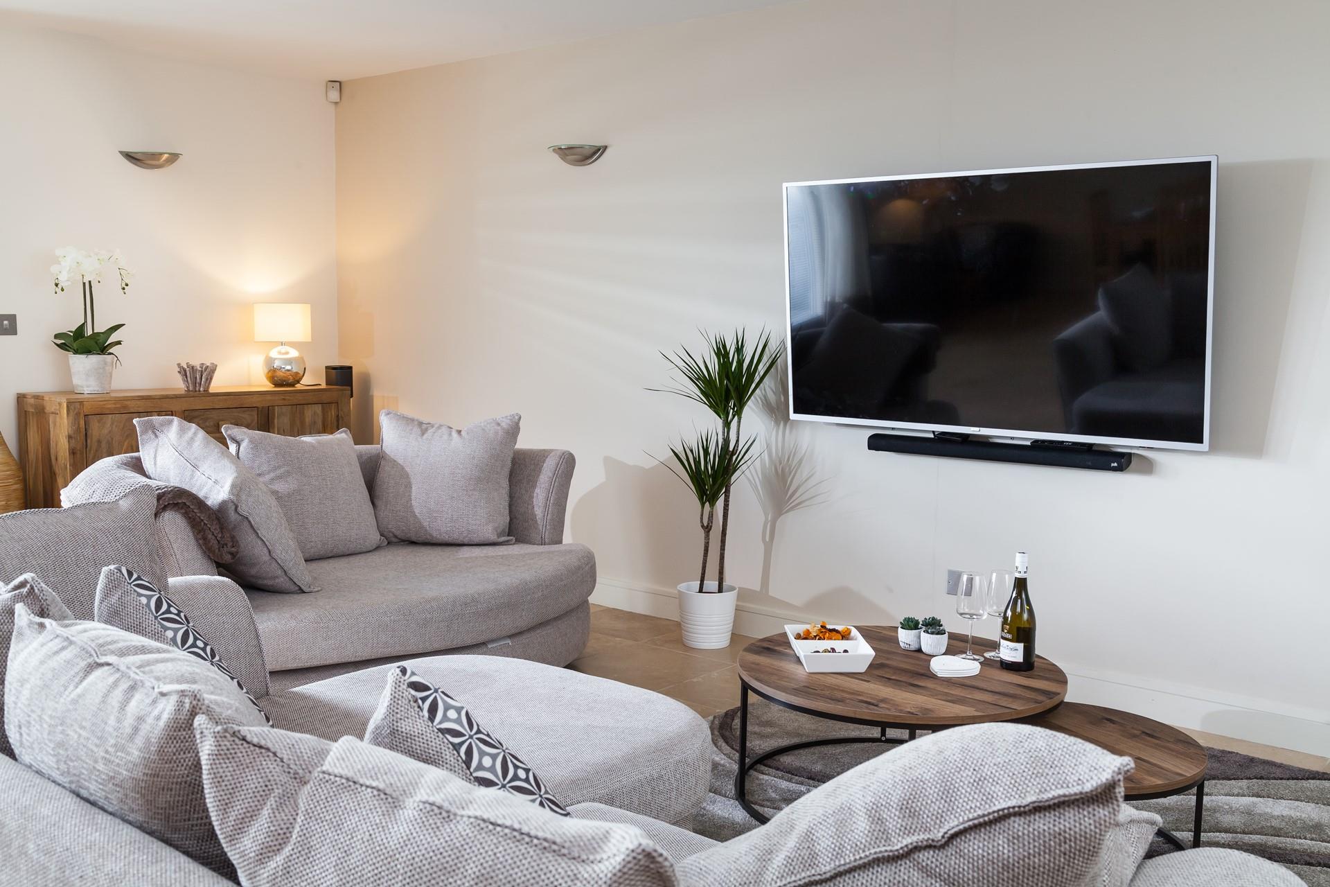 Cuddle up on the sofa after a busy day exploring the surrounding beaches.