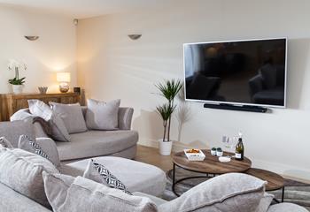 Cuddle up on the sofa after a busy day exploring the surrounding beaches.