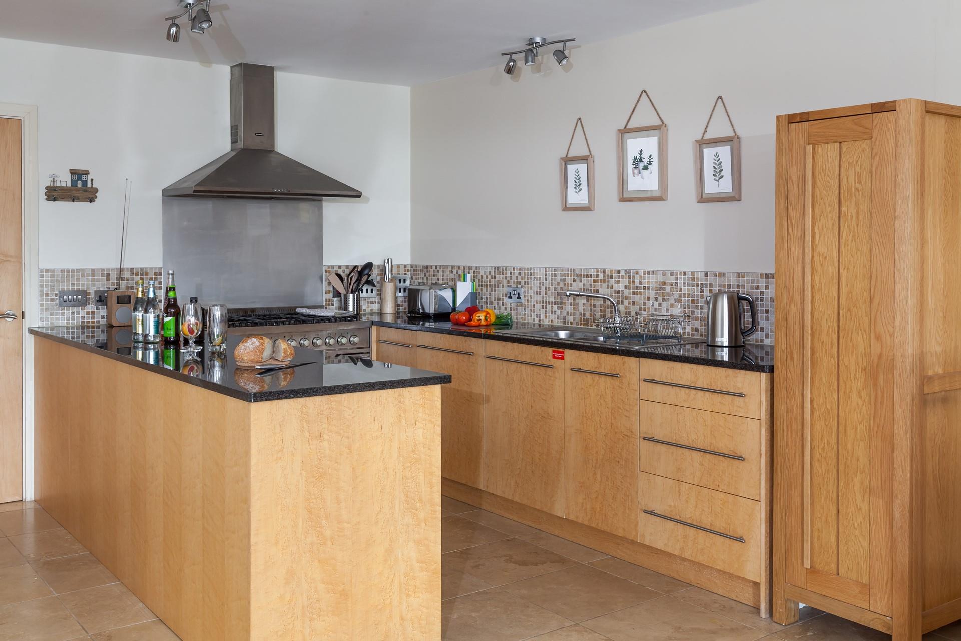 Cook up a storm in the kitchen, with plenty of space and a huge cooker for the most budding chefs. 