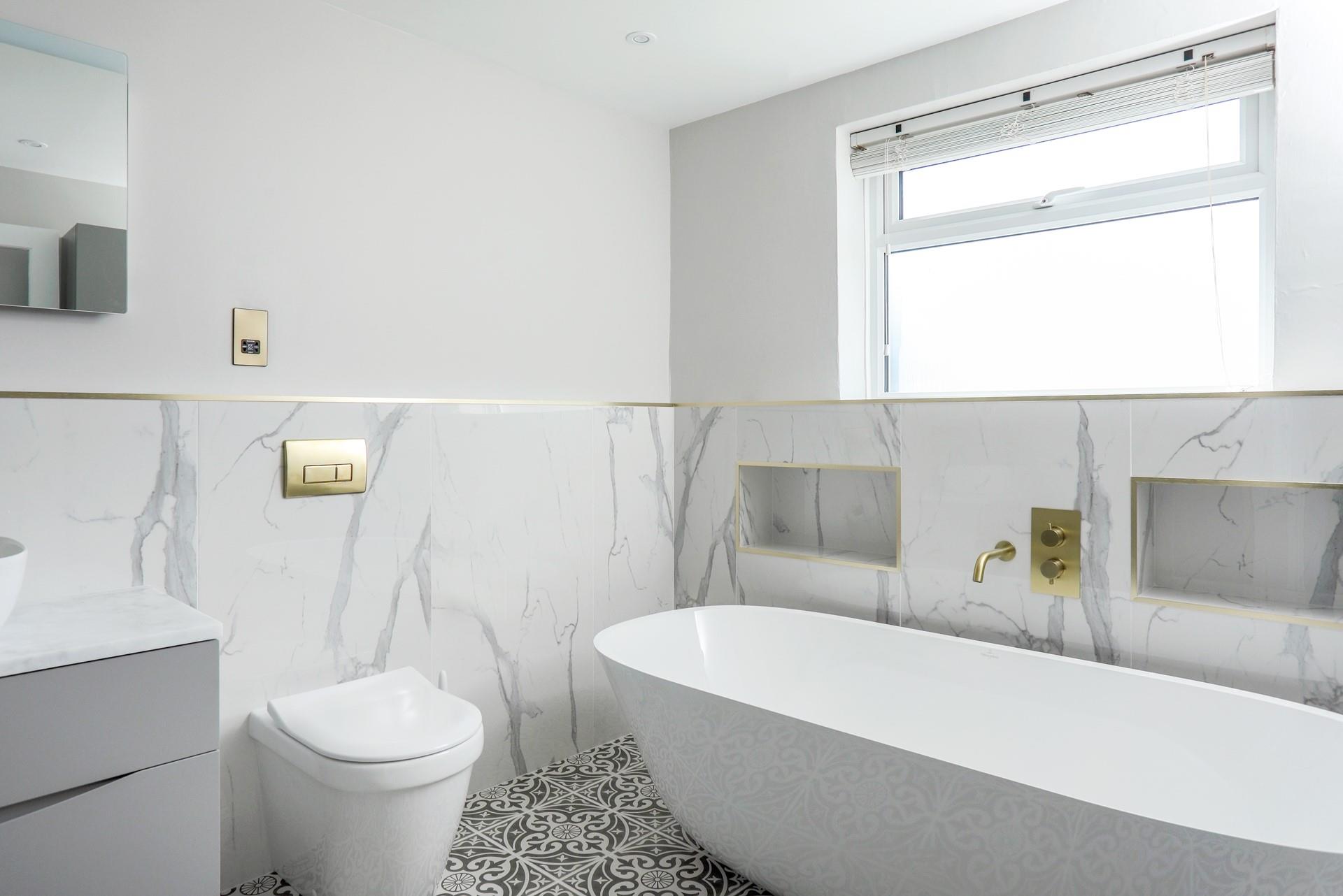 Fill the luxurious free-standing bath with bubbles and unwind after a busy day.