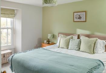 We love the sage green decor in bedroom 2!