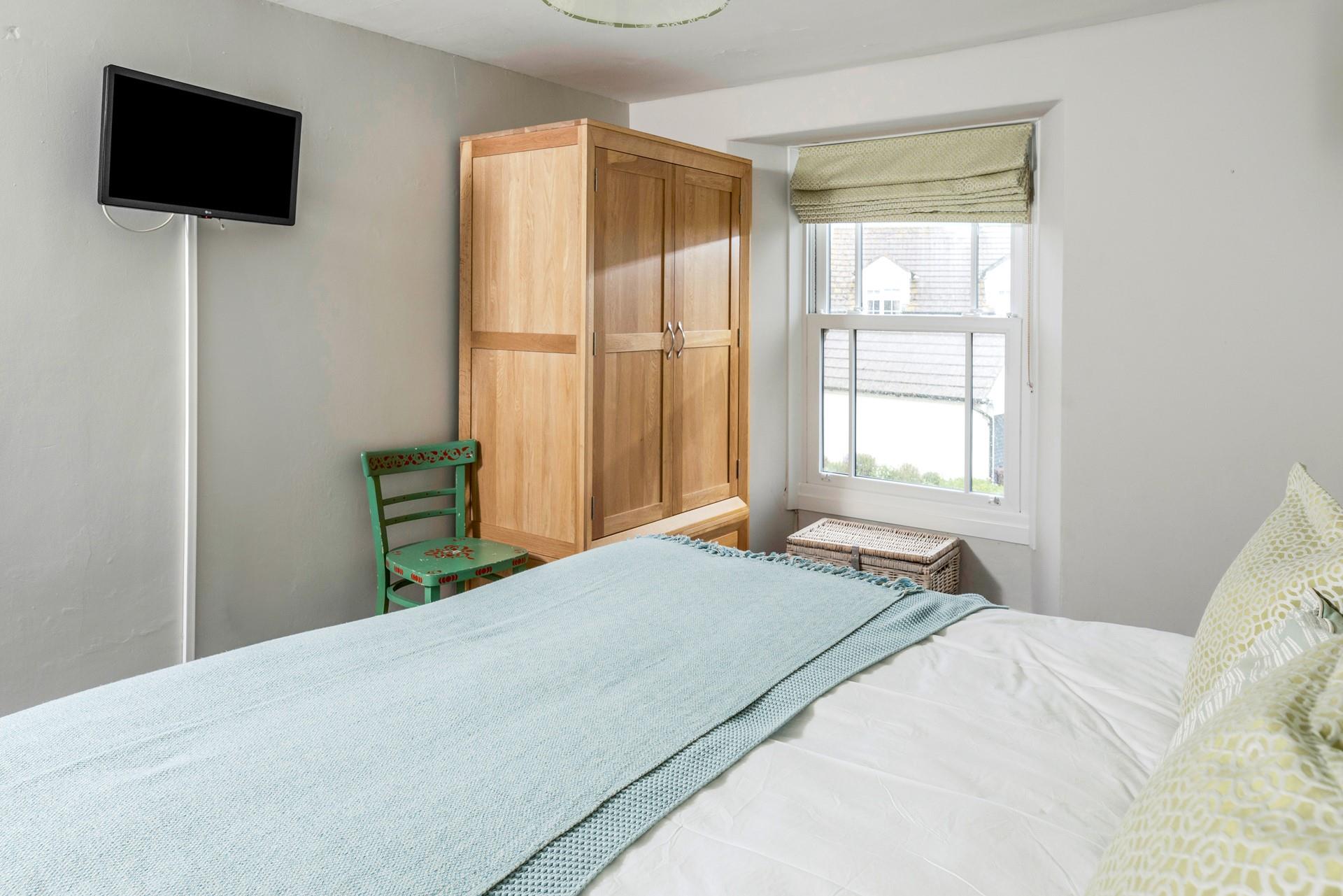 Open the blind to check the weather and decide on the plans for the day.