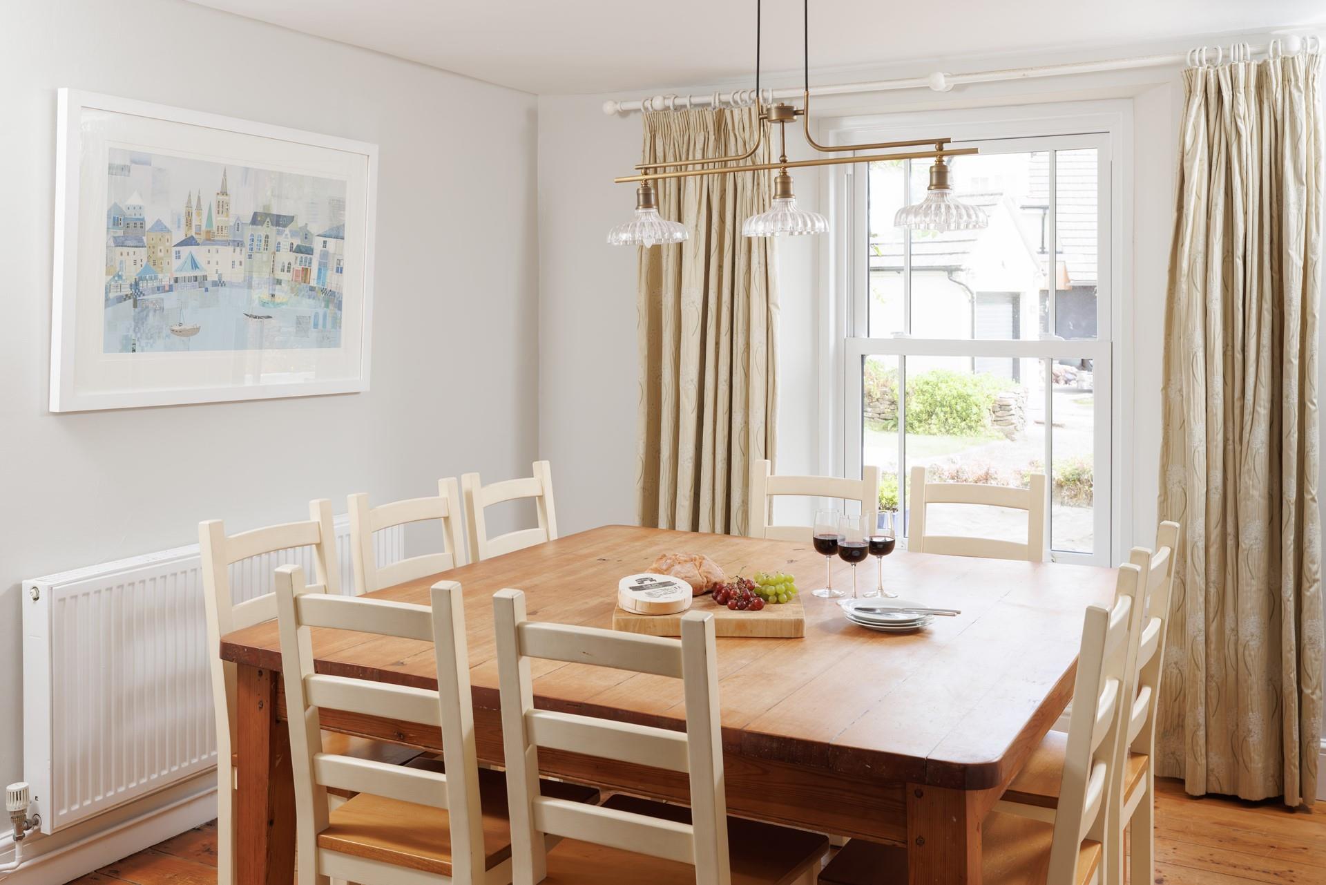 The dining room is a lovely space for spending some quality time with the whole family.