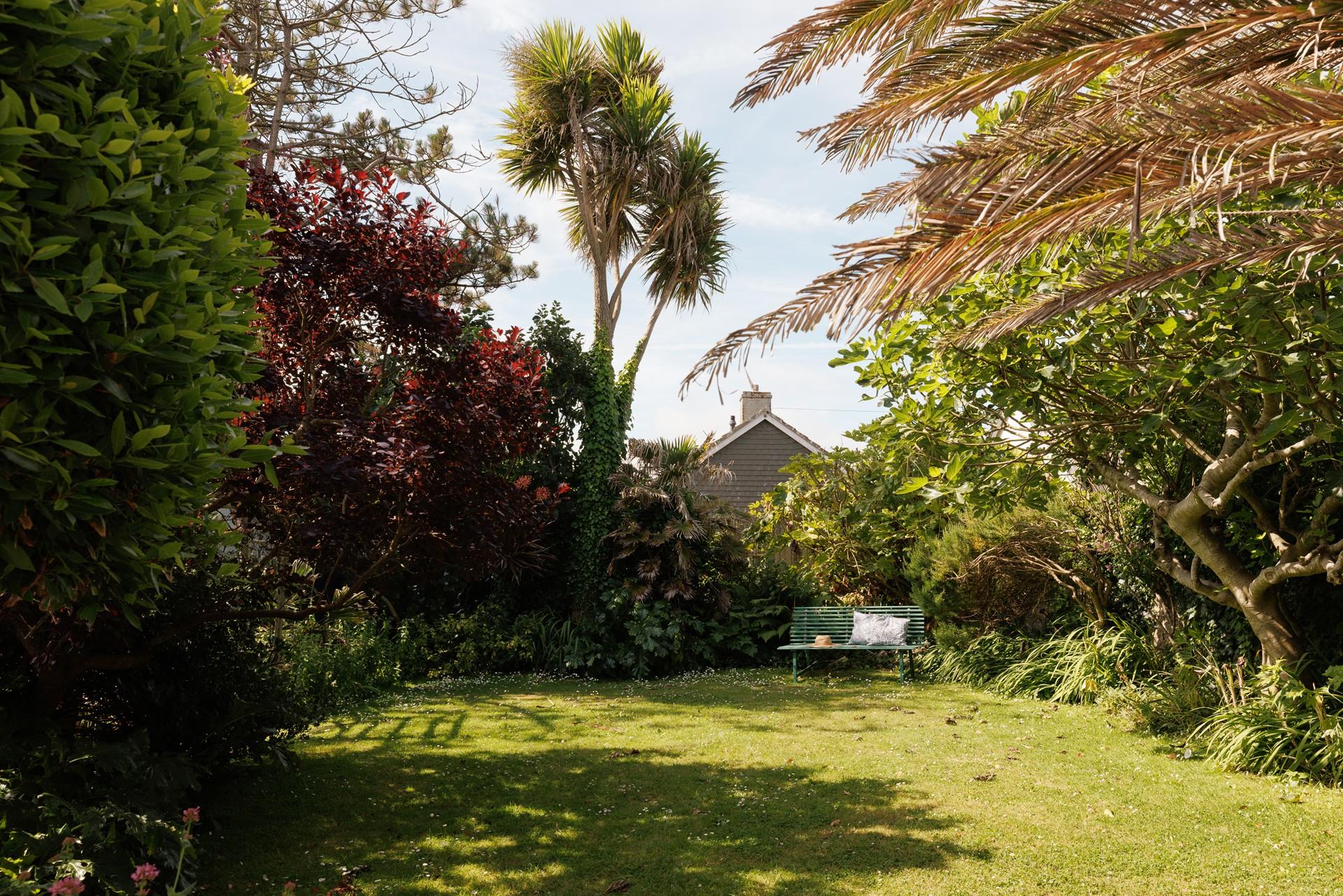 Take a morning cuppa out to the leafy garden.