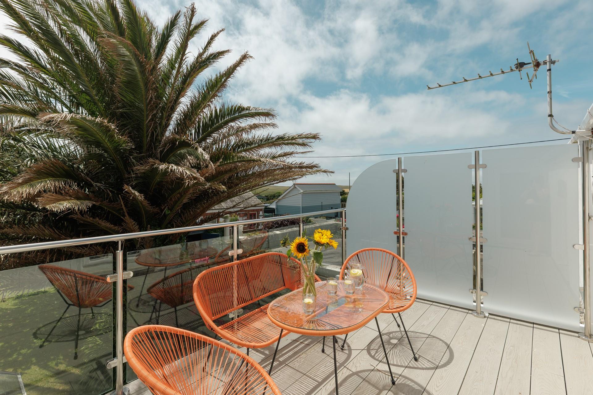 Watch the sun set from the balcony over the garden with a glass of wine.