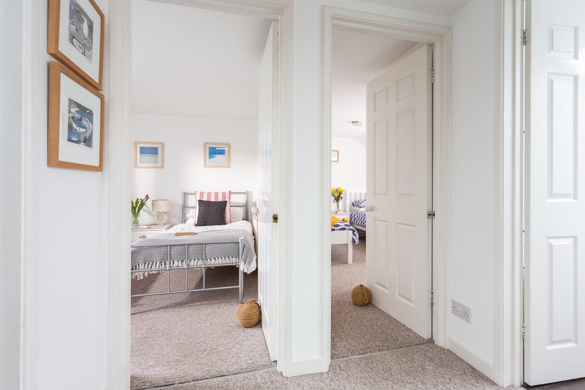 The pretty twin rooms are located side by side.