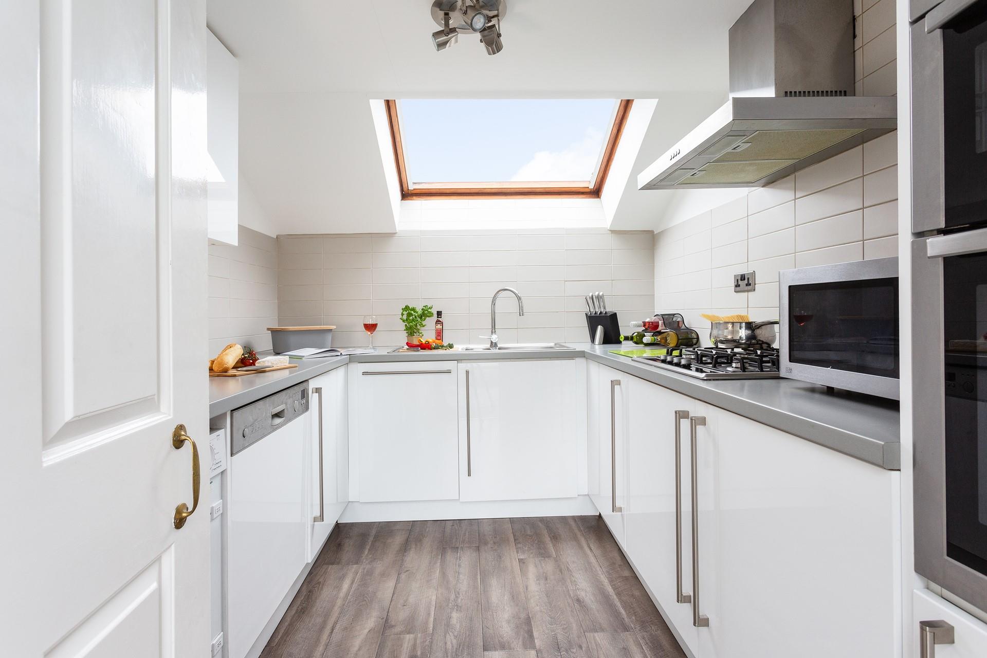 Bright, stylish and well-equipped, this gorgeous kitchen is perfect for whipping up delicious meals.