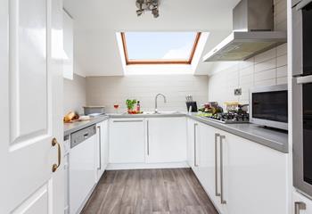 Bright, stylish and well-equipped, this gorgeous kitchen is perfect for whipping up delicious meals.