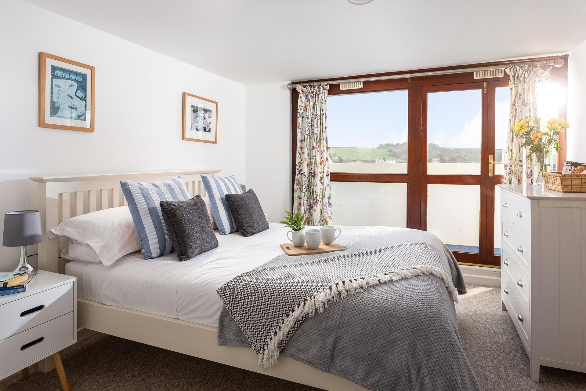 Treat yourself to a delicious breakfast in bed then finish your morning coffee on the balcony!