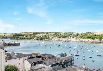 While away the hours, watching the boats sail down the beautiful estuary.