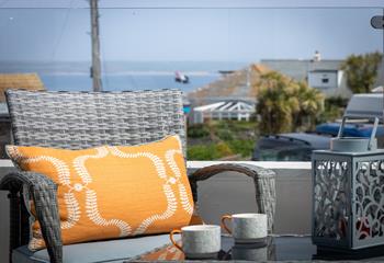 Sip your morning cuppa outside looking out at the sea views.